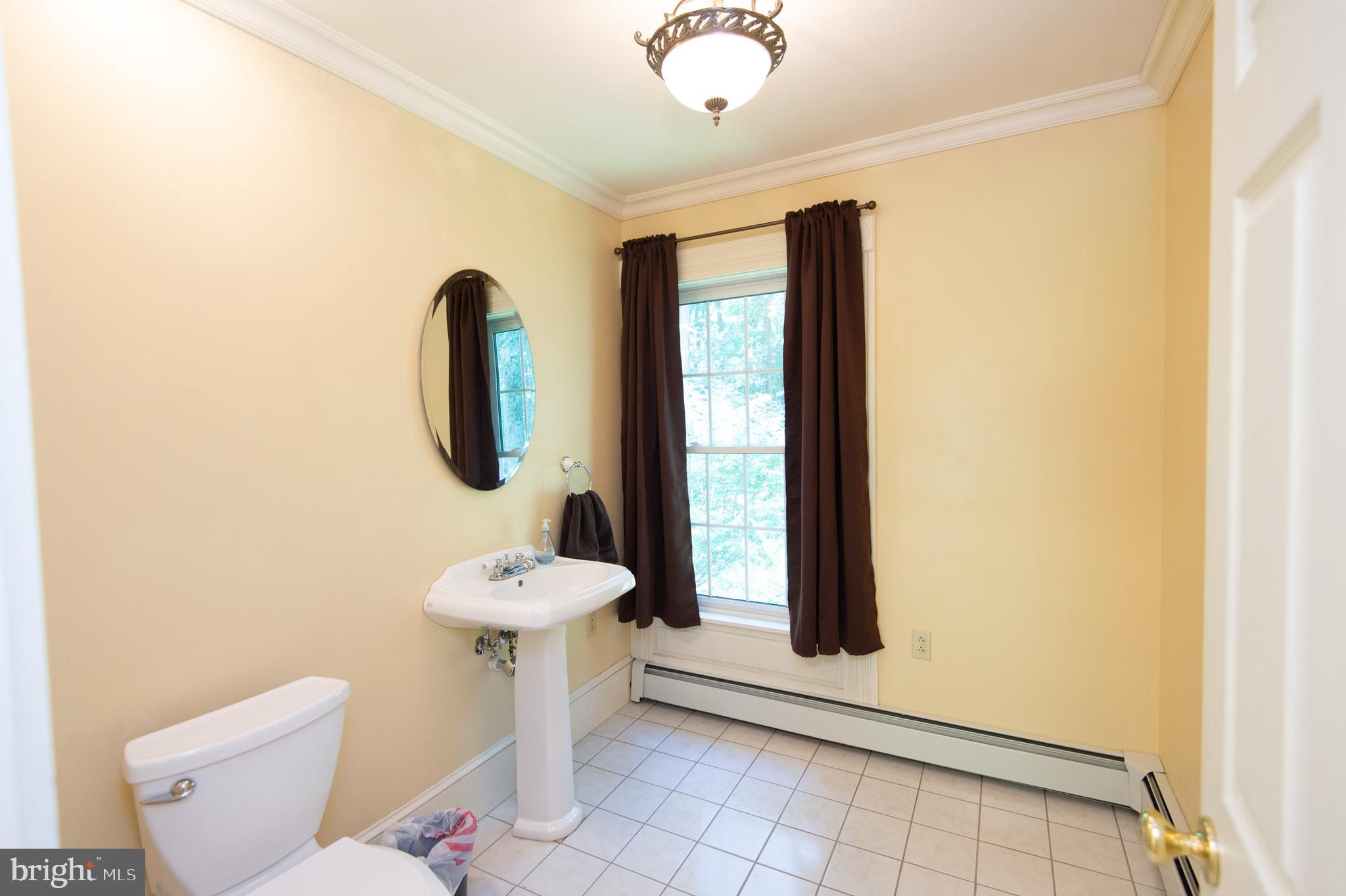 2136 Silver Goose Road Cambridge, MD 21613 - Photo 20 of 53 1st floor half bath