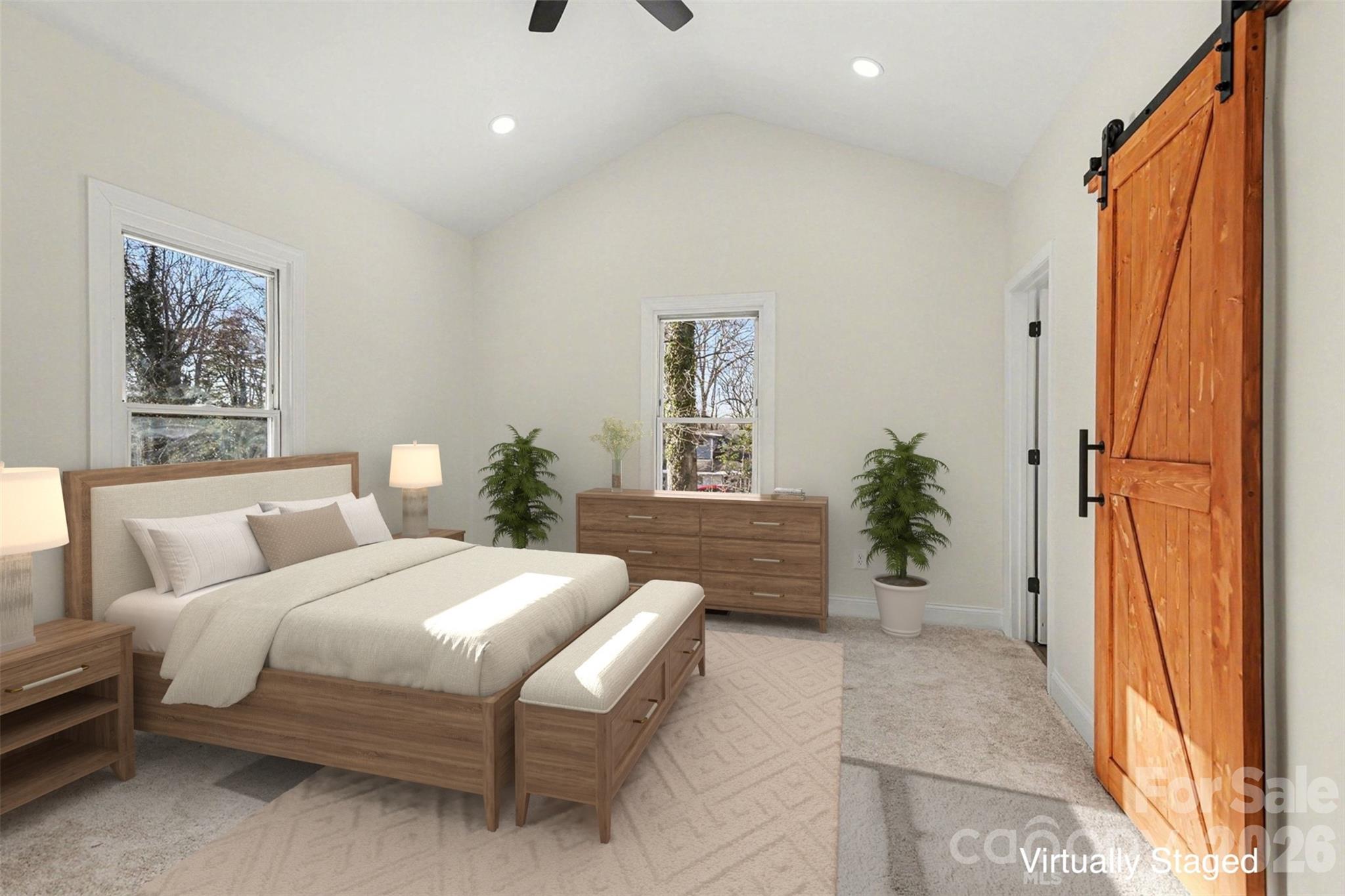 1013 Ridge Avenue Gastonia, NC 28052 - Photo 13 of 33 a bedroom with a large bed and a potted plant