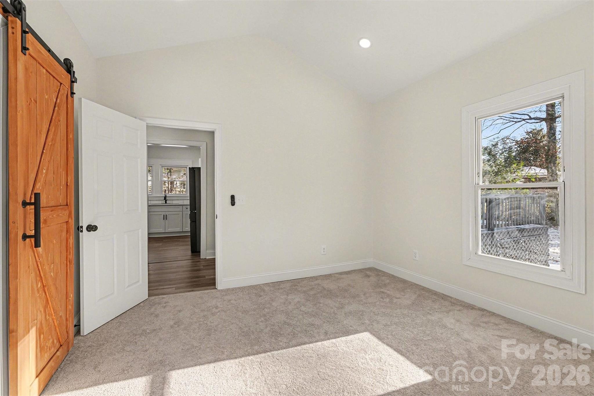 1013 Ridge Avenue Gastonia, NC 28052 - Photo 16 of 33 an empty room with windows and closet