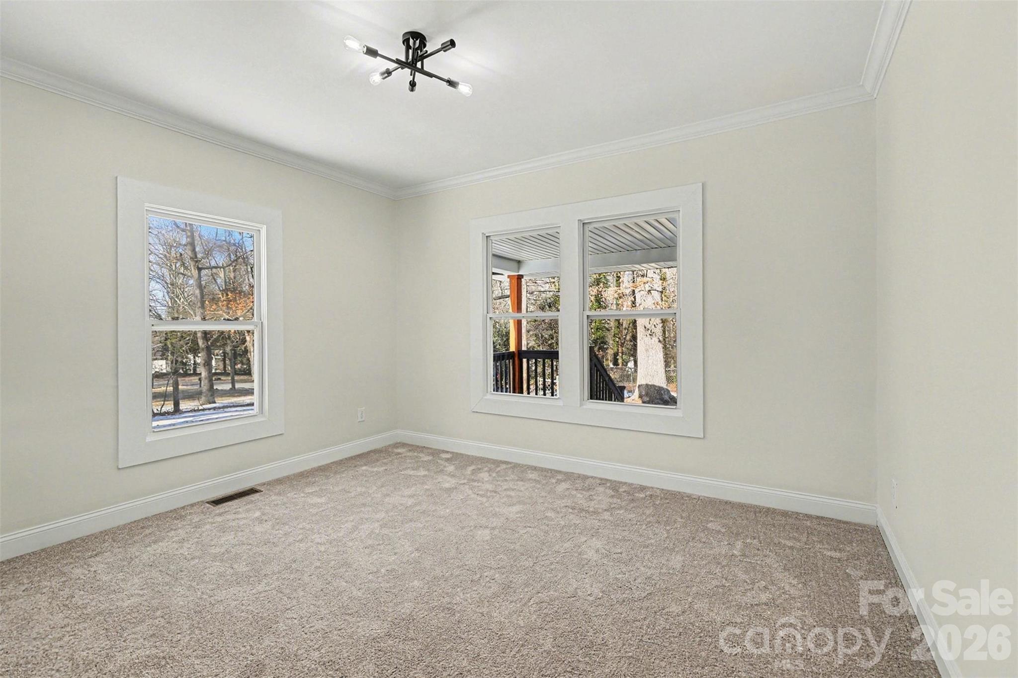1013 Ridge Avenue Gastonia, NC 28052 - Photo 21 of 33 an empty room with windows and closet