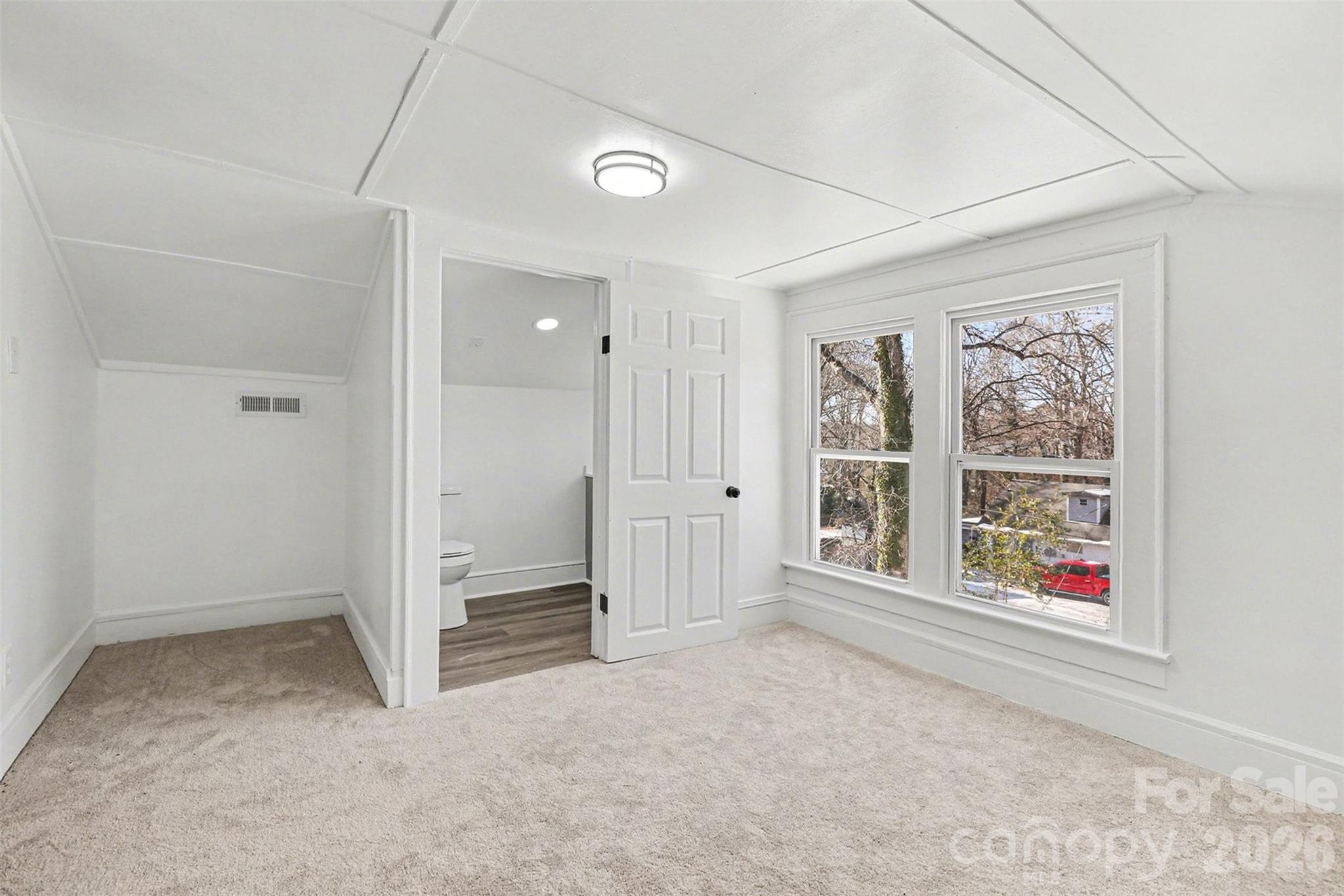 1013 Ridge Avenue Gastonia, NC 28052 - Photo 25 of 33 an empty room with windows and closet