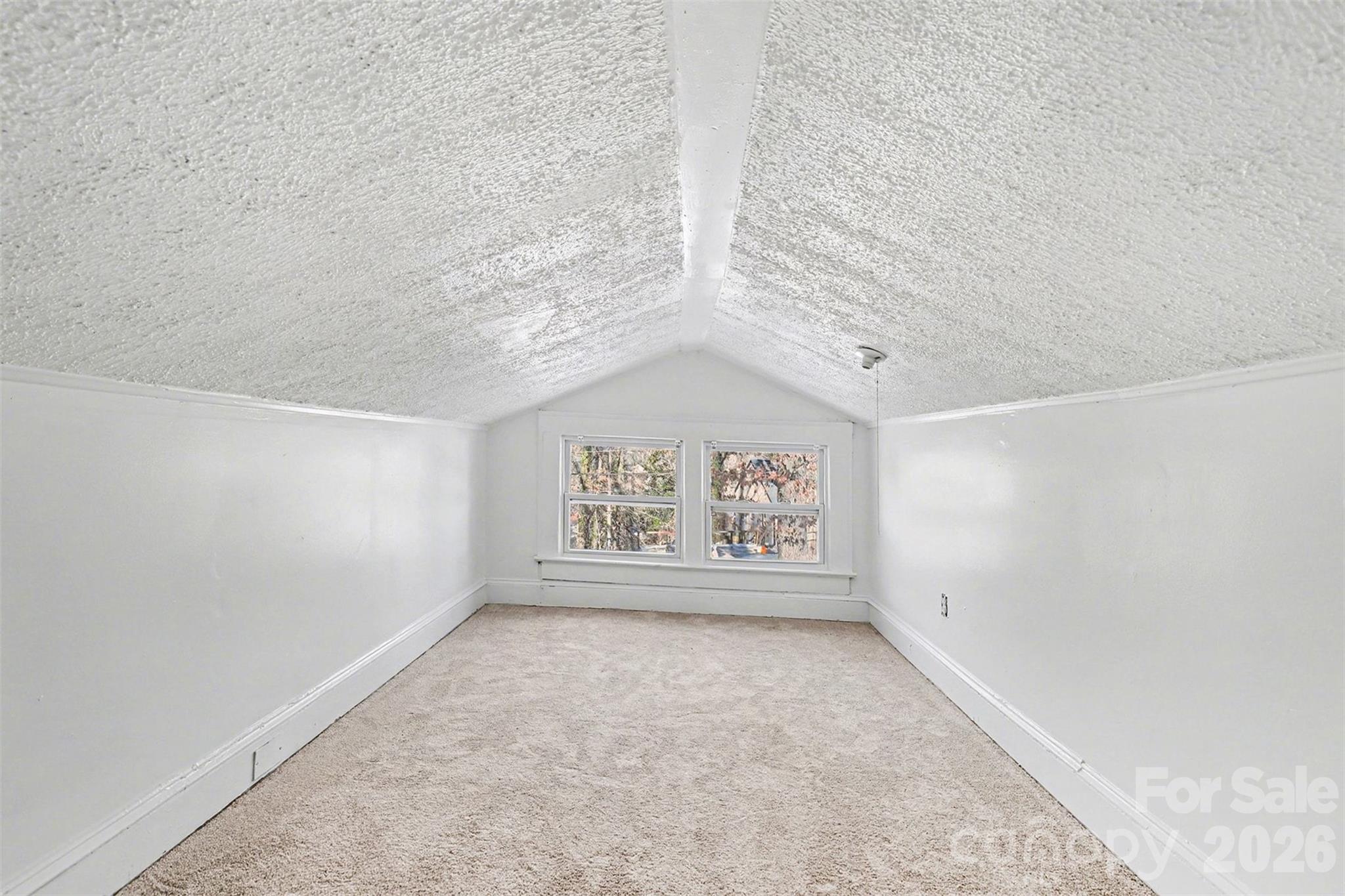 1013 Ridge Avenue Gastonia, NC 28052 - Photo 27 of 33 an empty room with windows