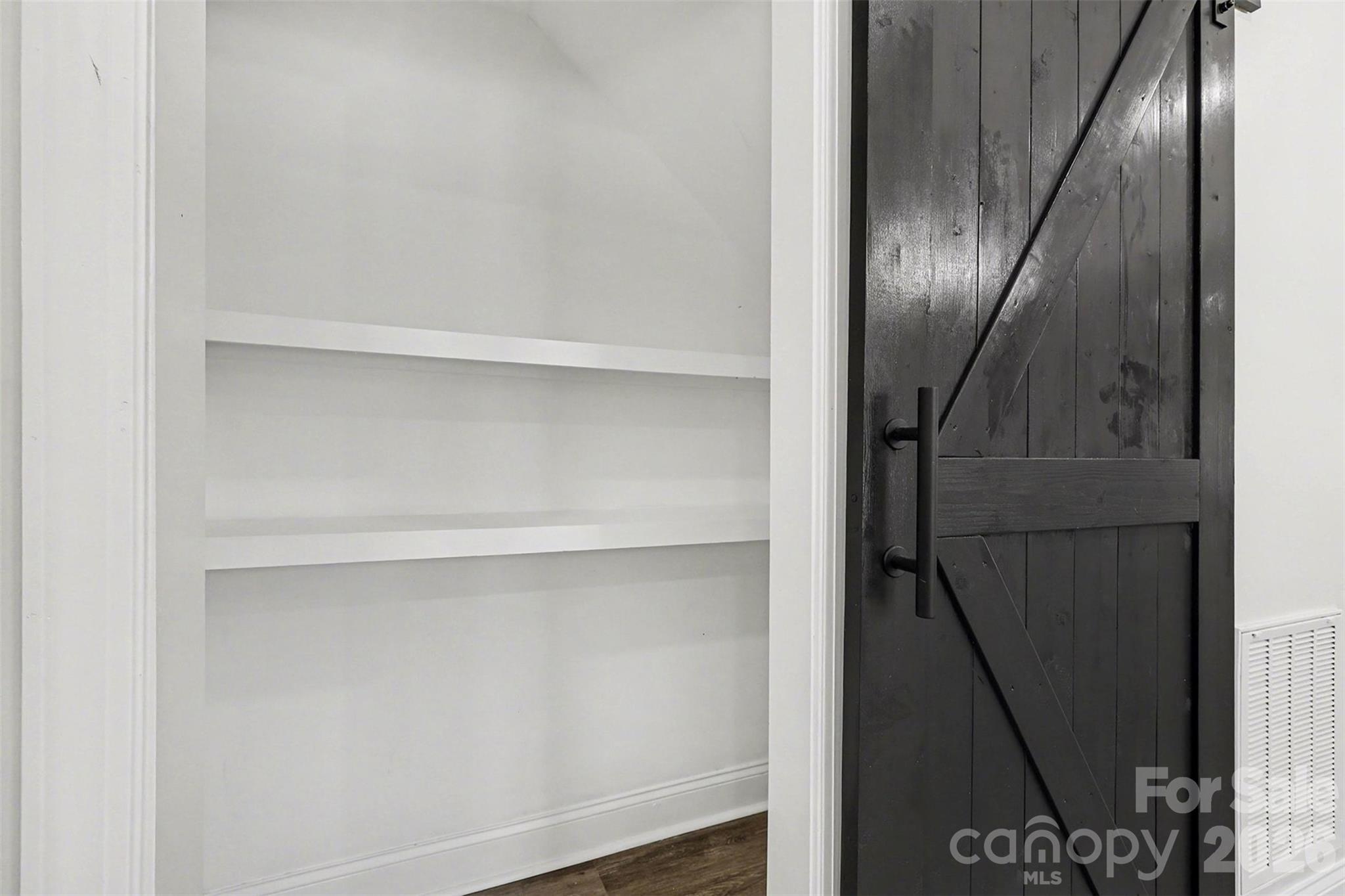 1013 Ridge Avenue Gastonia, NC 28052 - Photo 29 of 33 a view of staircase with wooden floor