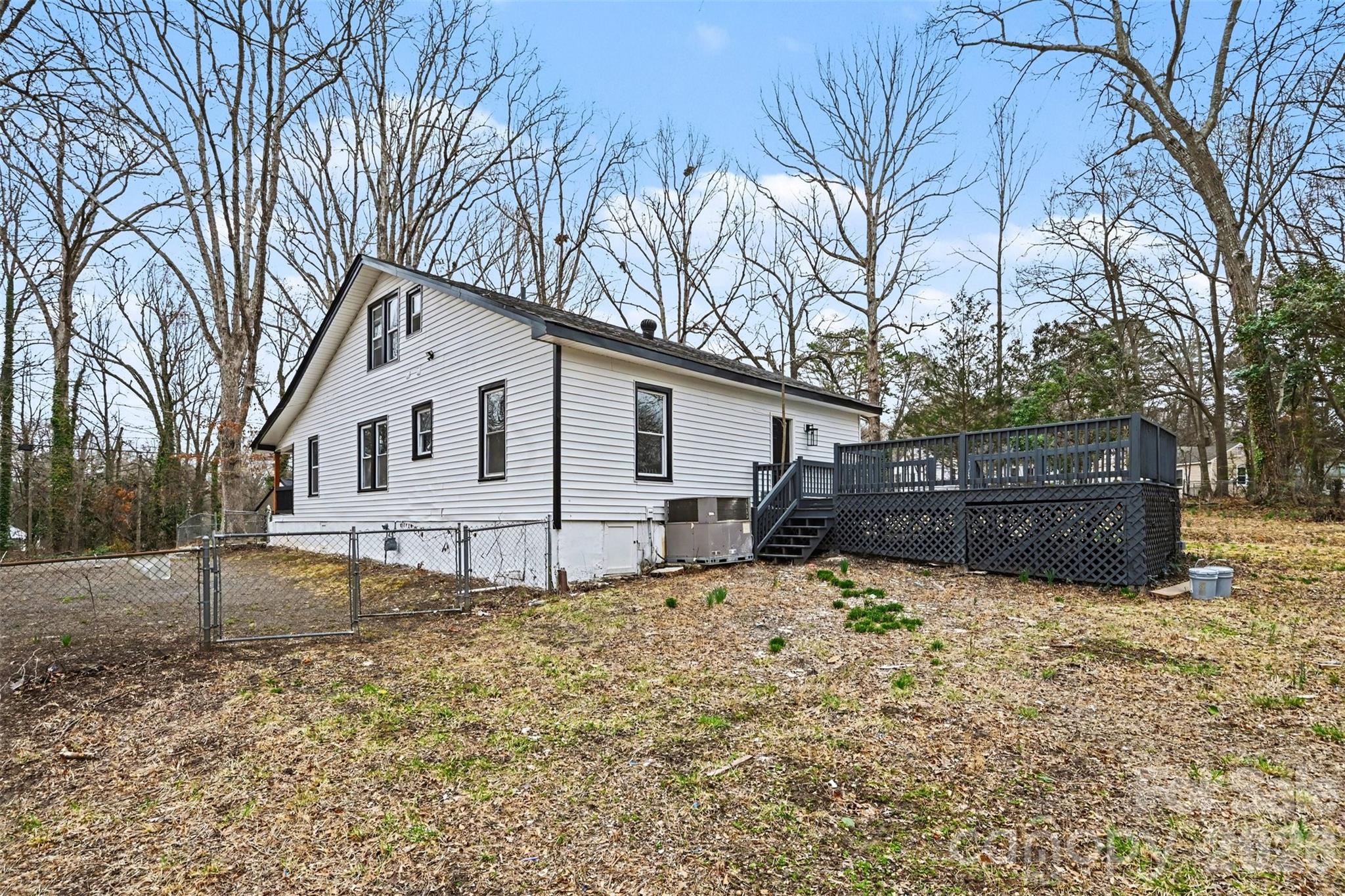 1013 Ridge Avenue Gastonia, NC 28052 - Photo 33 of 33 a view of a house with a yard covered in snow