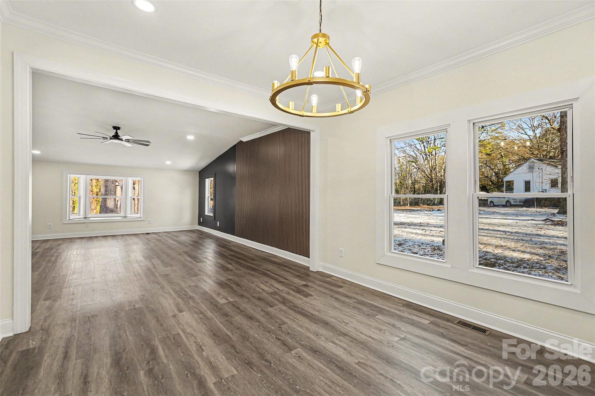 1013 Ridge Avenue Gastonia, NC 28052 - Photo 6 of 33 a view of a room with a window and wooden floor