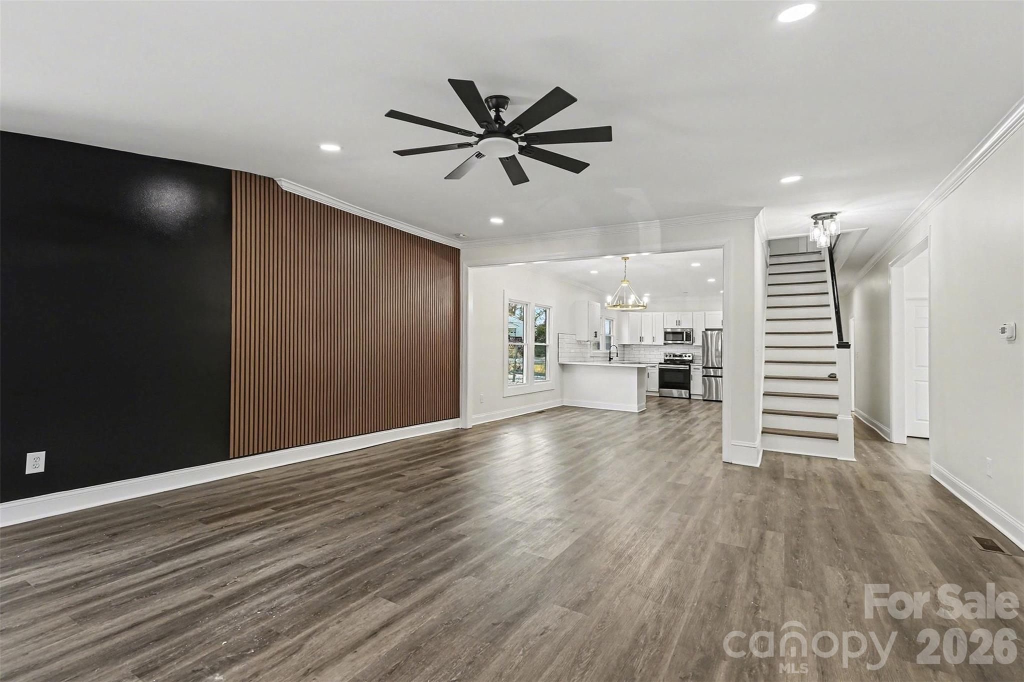 1013 Ridge Avenue Gastonia, NC 28052 - Photo 8 of 33 a view of a livingroom with a hardwood floor