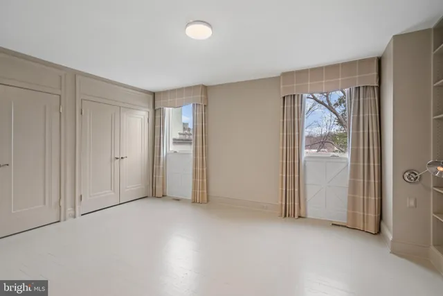 an empty room with a door