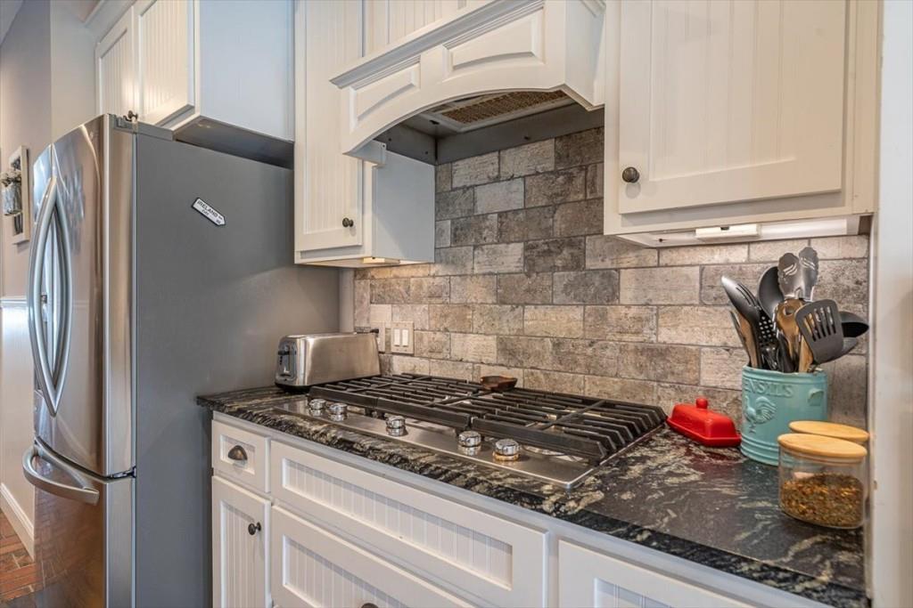 3055 Spring Hill Drive Monroe, GA 30656 - Photo 19 of 64 a kitchen with stainless steel appliances granite countertop a refrigerator and a stove