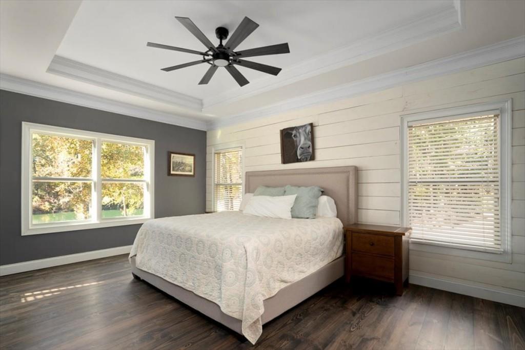 3055 Spring Hill Drive Monroe, GA 30656 - Photo 27 of 64 a bedroom with a large bed and a window