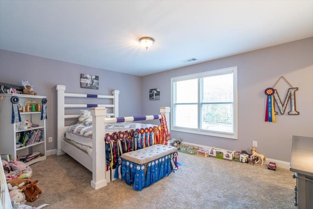 3055 Spring Hill Drive Monroe, GA 30656 - Photo 33 of 64 a bedroom with furniture and a window