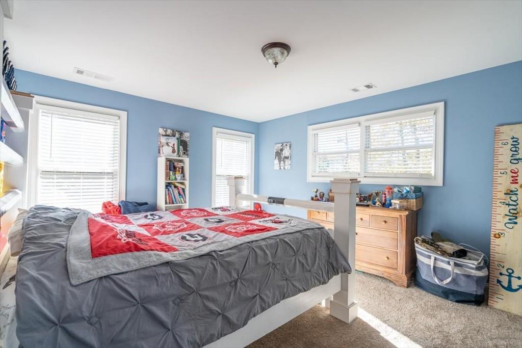 3055 Spring Hill Drive Monroe, GA 30656 - Photo 34 of 64 a bedroom with a bed and a window