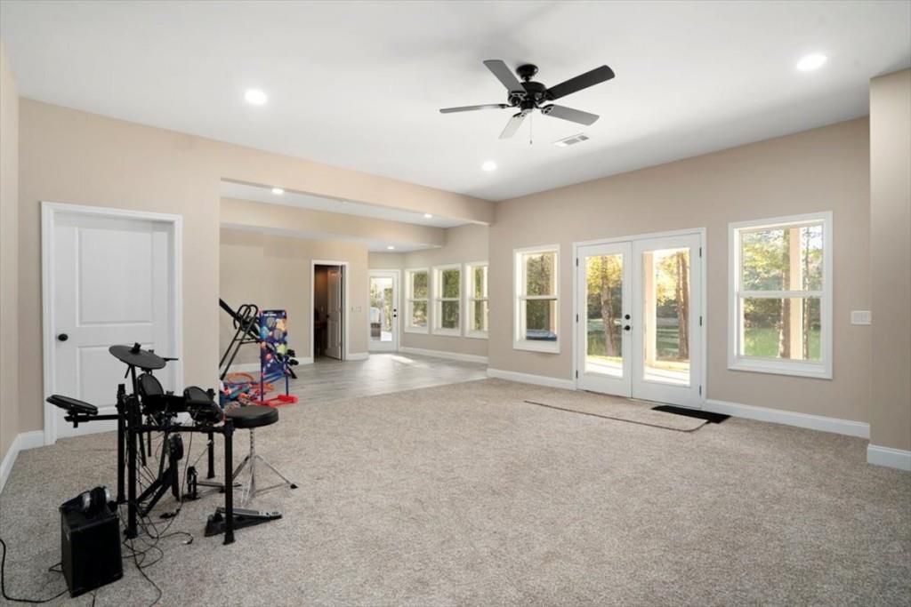 3055 Spring Hill Drive Monroe, GA 30656 - Photo 37 of 64 a living room with furniture and white walls