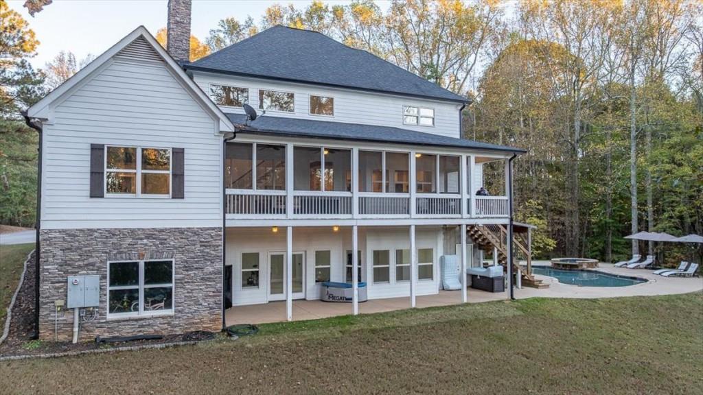 3055 Spring Hill Drive Monroe, GA 30656 - Photo 41 of 64 a front view of a house with a yard