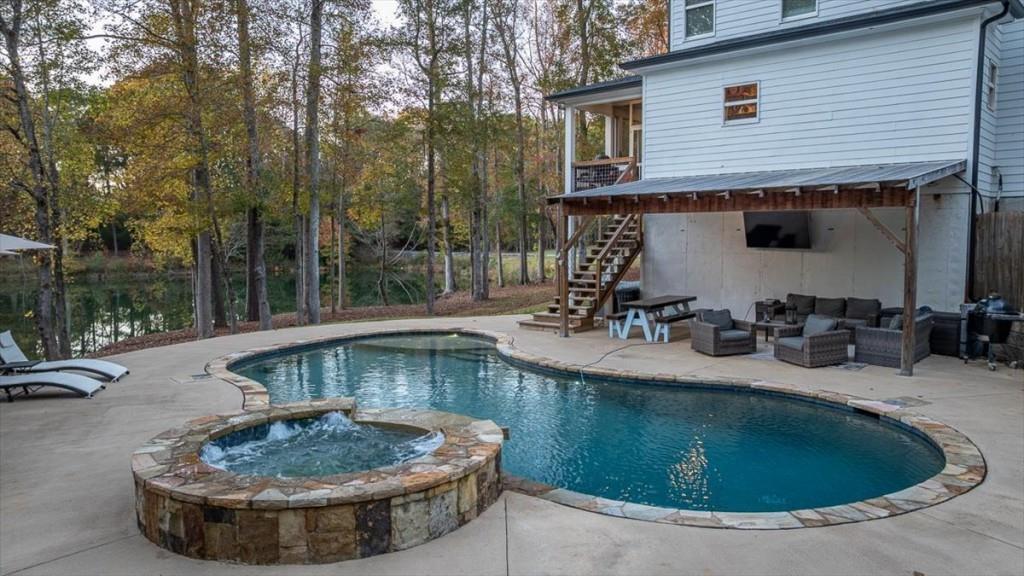 3055 Spring Hill Drive Monroe, GA 30656 - Photo 44 of 64 a view of a house with swimming pool