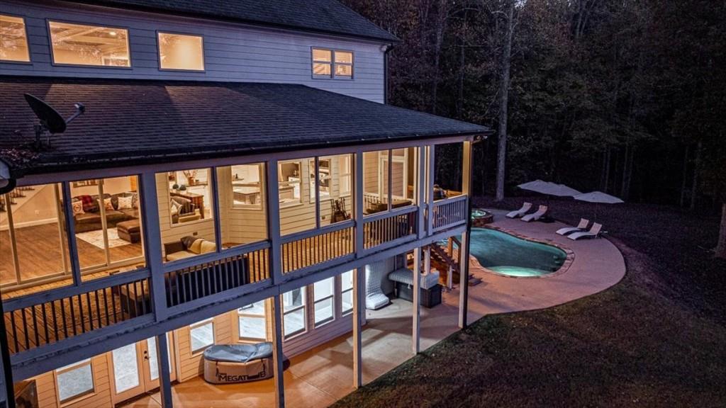 3055 Spring Hill Drive Monroe, GA 30656 - Photo 48 of 64 a backyard of a house with seating space