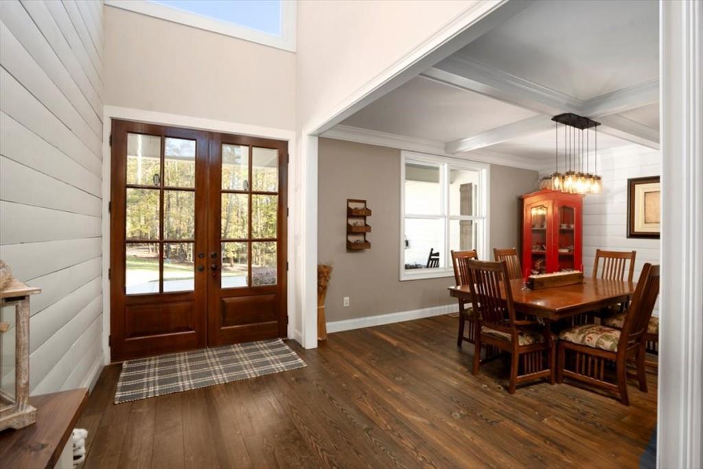 3055 Spring Hill Drive Monroe, GA 30656 - Photo 7 of 64 a view of a dining room with furniture and wooden floor