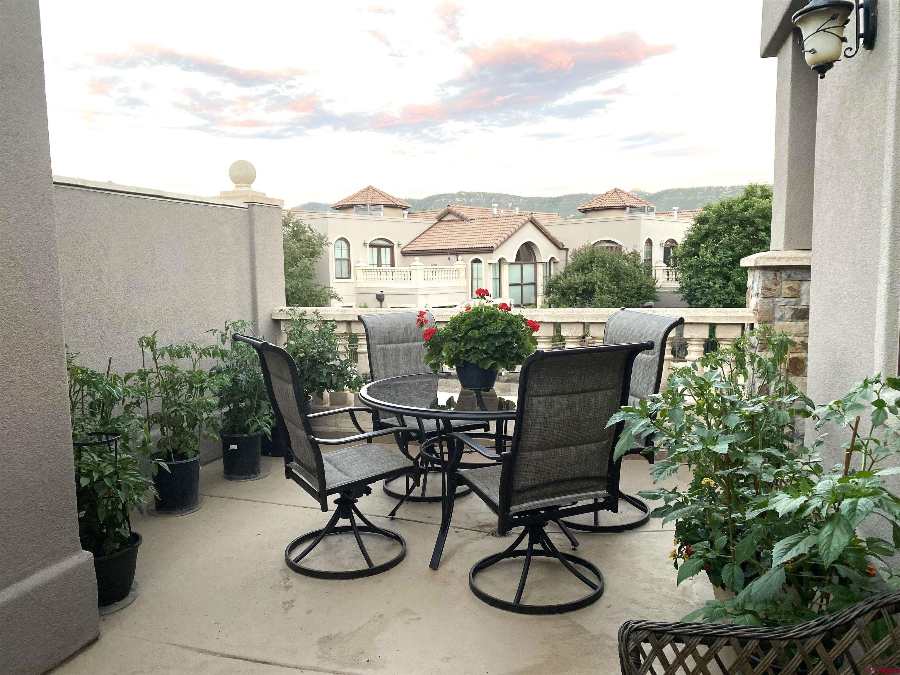 3416 Main Avenue, Unit 203 Durango, CO 81301 - Photo 13 of 34 a view of a chairs and table in patio