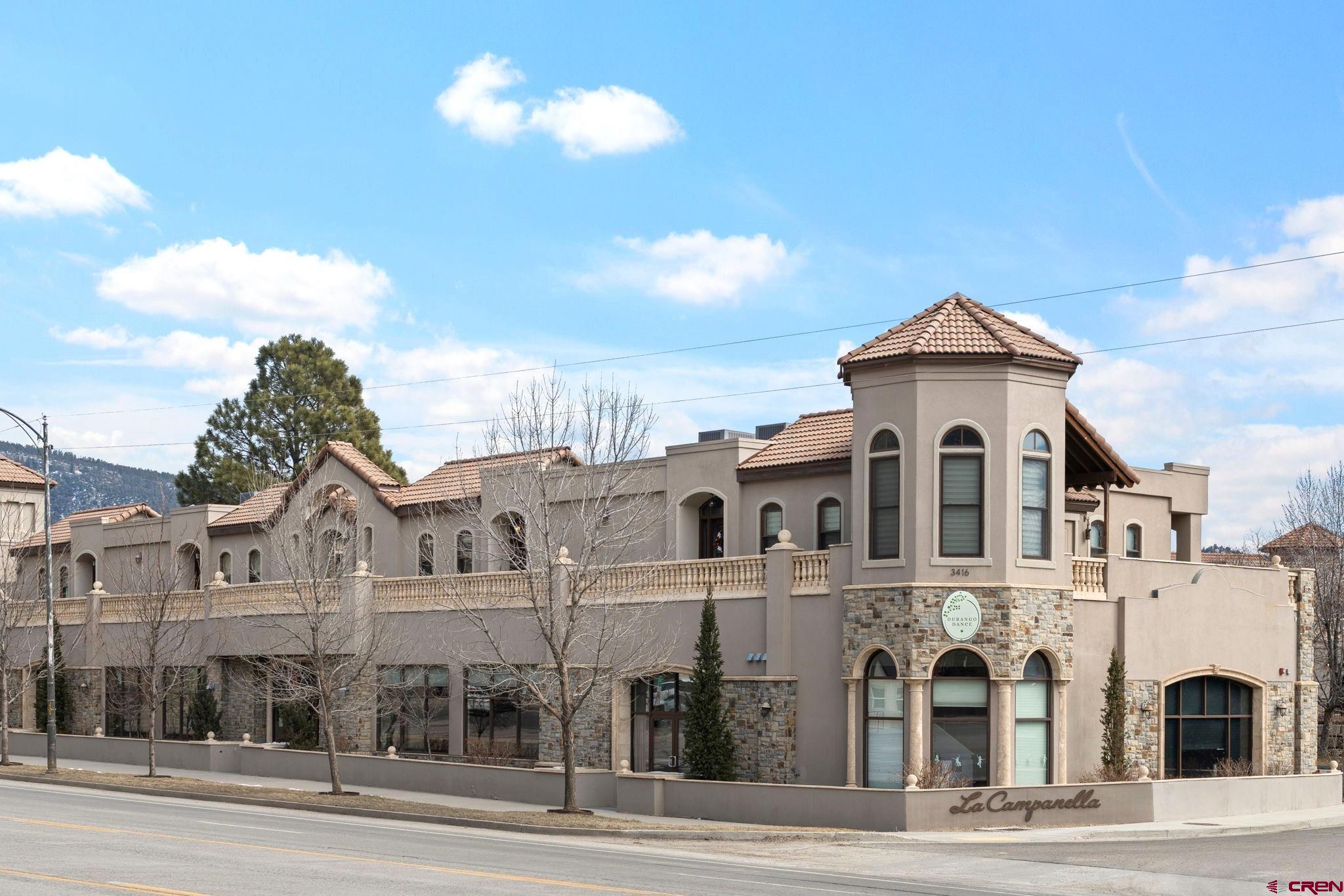 3416 Main Avenue, Unit 203 Durango, CO 81301 - Photo 2 of 34 a view of a big house with many windows
