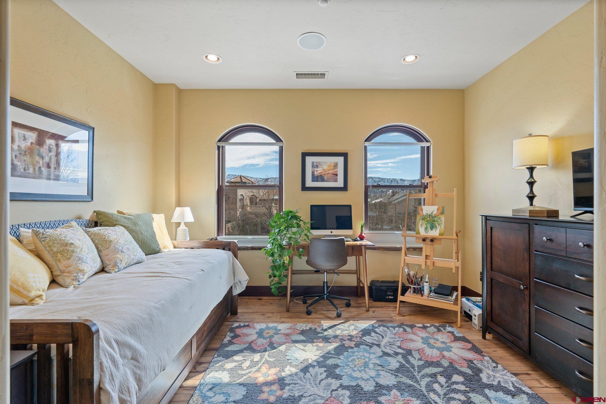 3416 Main Avenue, Unit 203 Durango, CO 81301 - Photo 23 of 34 a living room with furniture and a flat screen tv