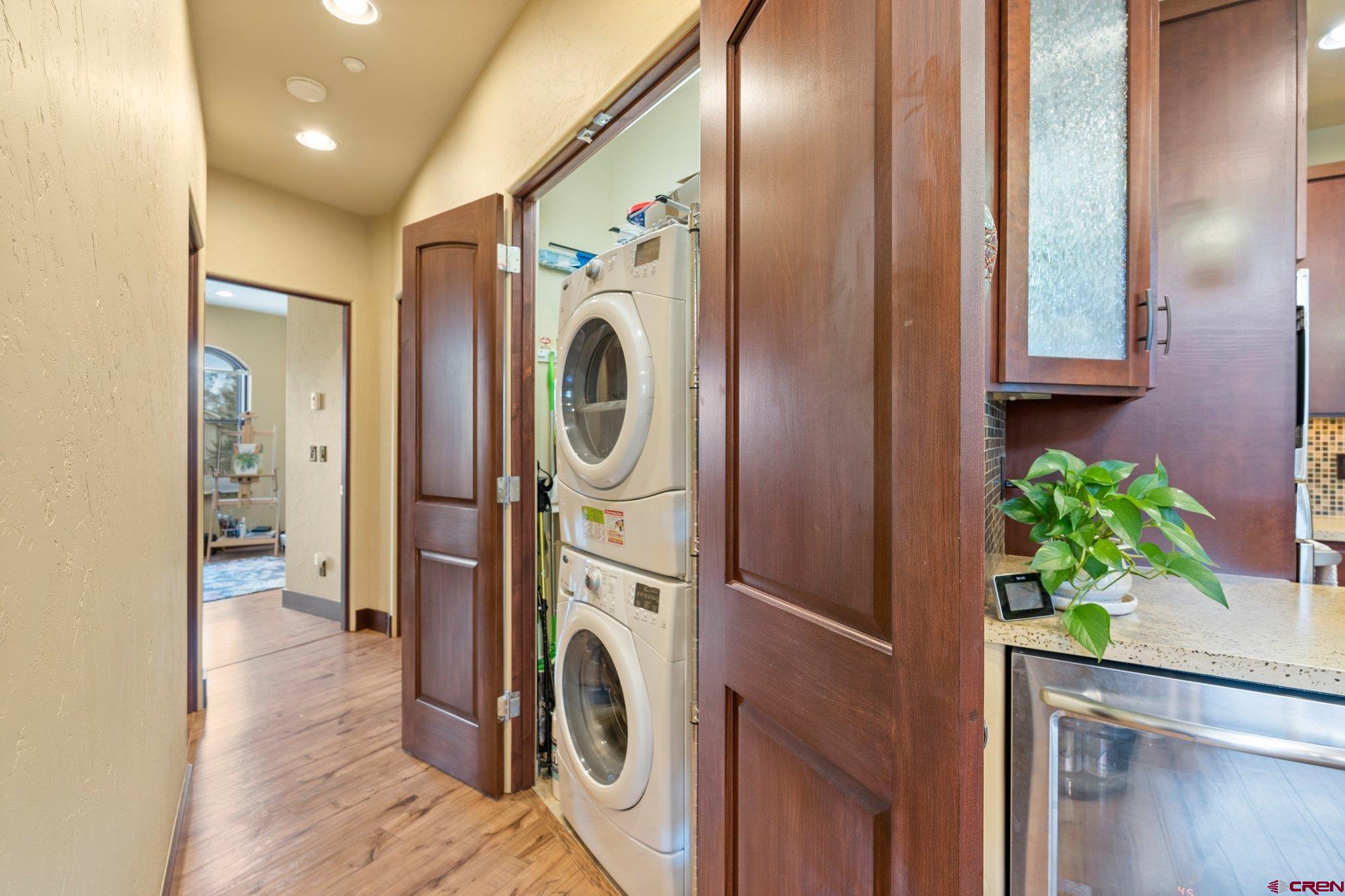 3416 Main Avenue, Unit 203 Durango, CO 81301 - Photo 27 of 34 a view of a hallway with washer and dryer