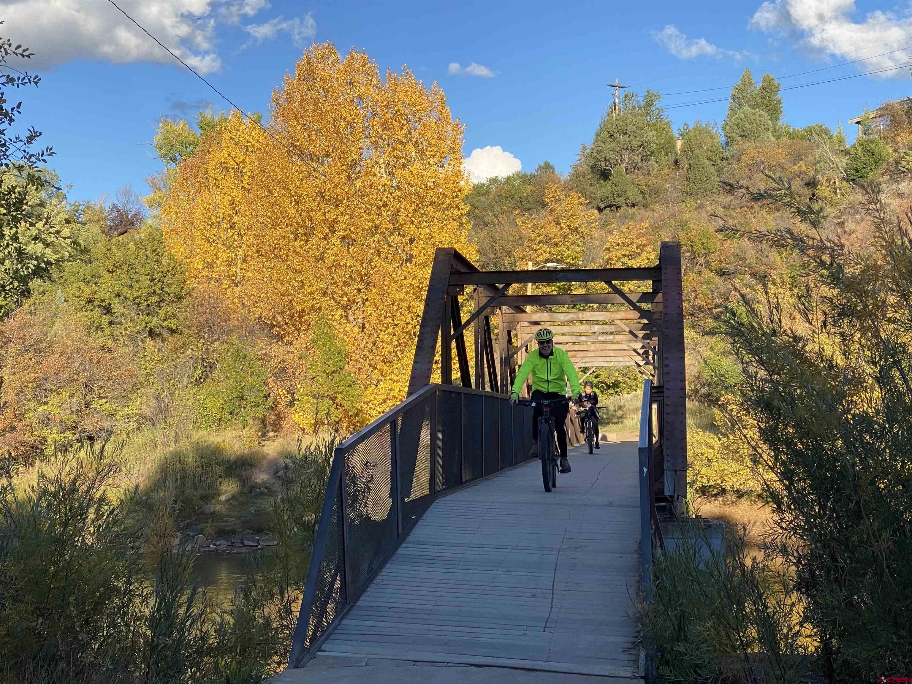 3416 Main Avenue, Unit 203 Durango, CO 81301 - Photo 31 of 34 a view of a pathway of a building with a yard