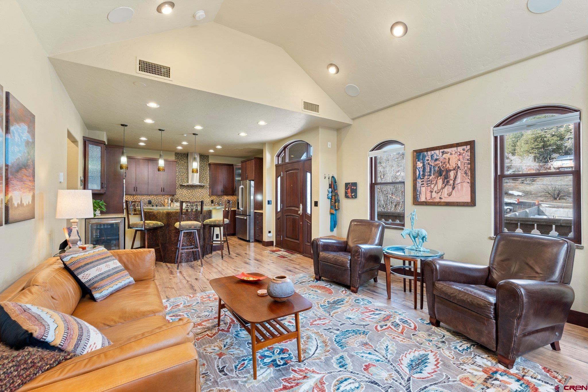 3416 Main Avenue, Unit 203 Durango, CO 81301 - Photo 8 of 34 a living room with furniture kitchen view and a large window