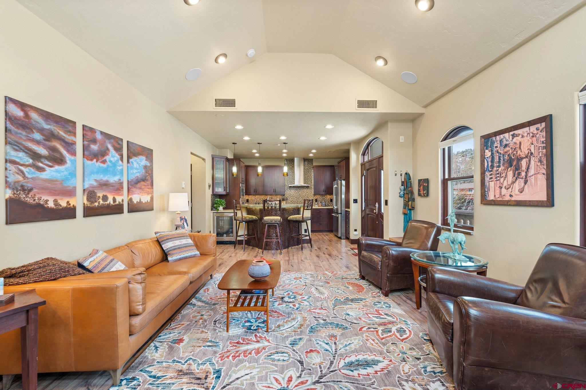 3416 Main Avenue, Unit 203 Durango, CO 81301 - Photo 9 of 34 a living room with furniture and a view of kitchen