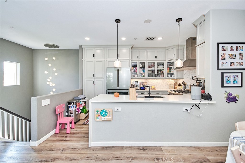 7331 Shelby Place, Unit 8 Rancho Cucamonga, CA 91739 - Photo 17 of 41 a view of counter top space and kitchen view