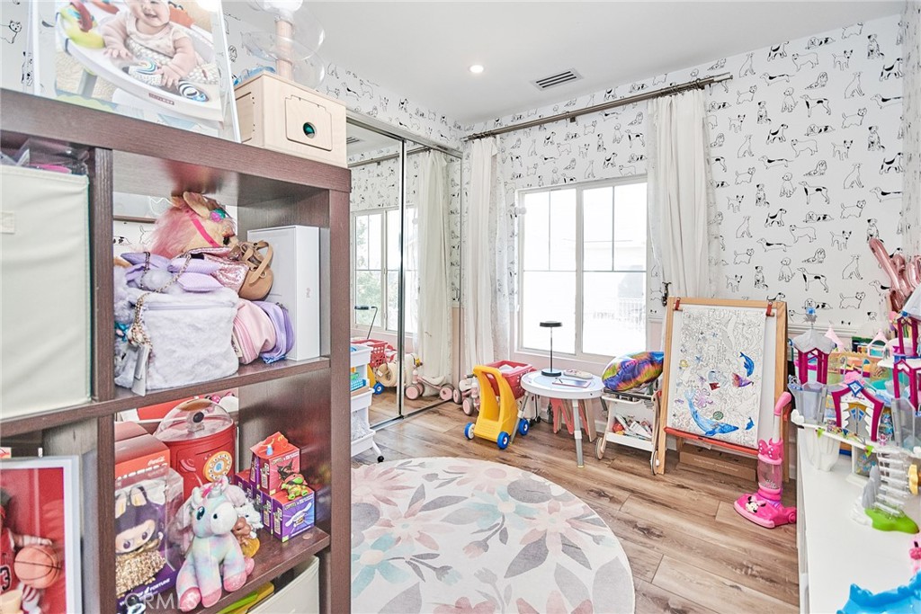 7331 Shelby Place, Unit 8 Rancho Cucamonga, CA 91739 - Photo 22 of 41 a bed room with furniture and window