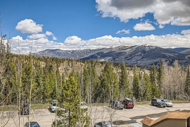 a view of a terrace with a table and chairs