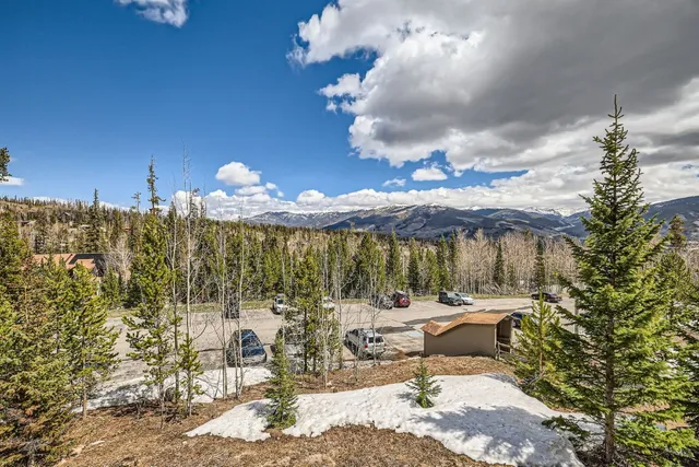 a view of a patio with table and chairs and potted plants