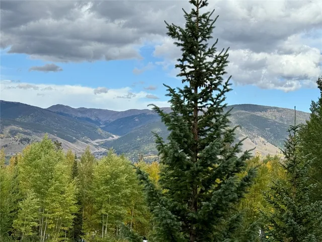 a view of mountain view with mountains in the background