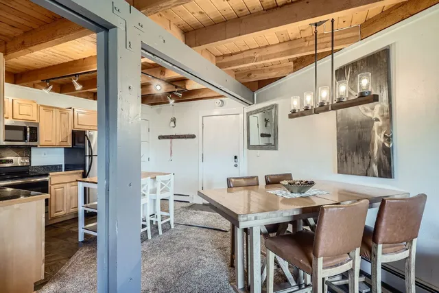a view of a dining room with furniture