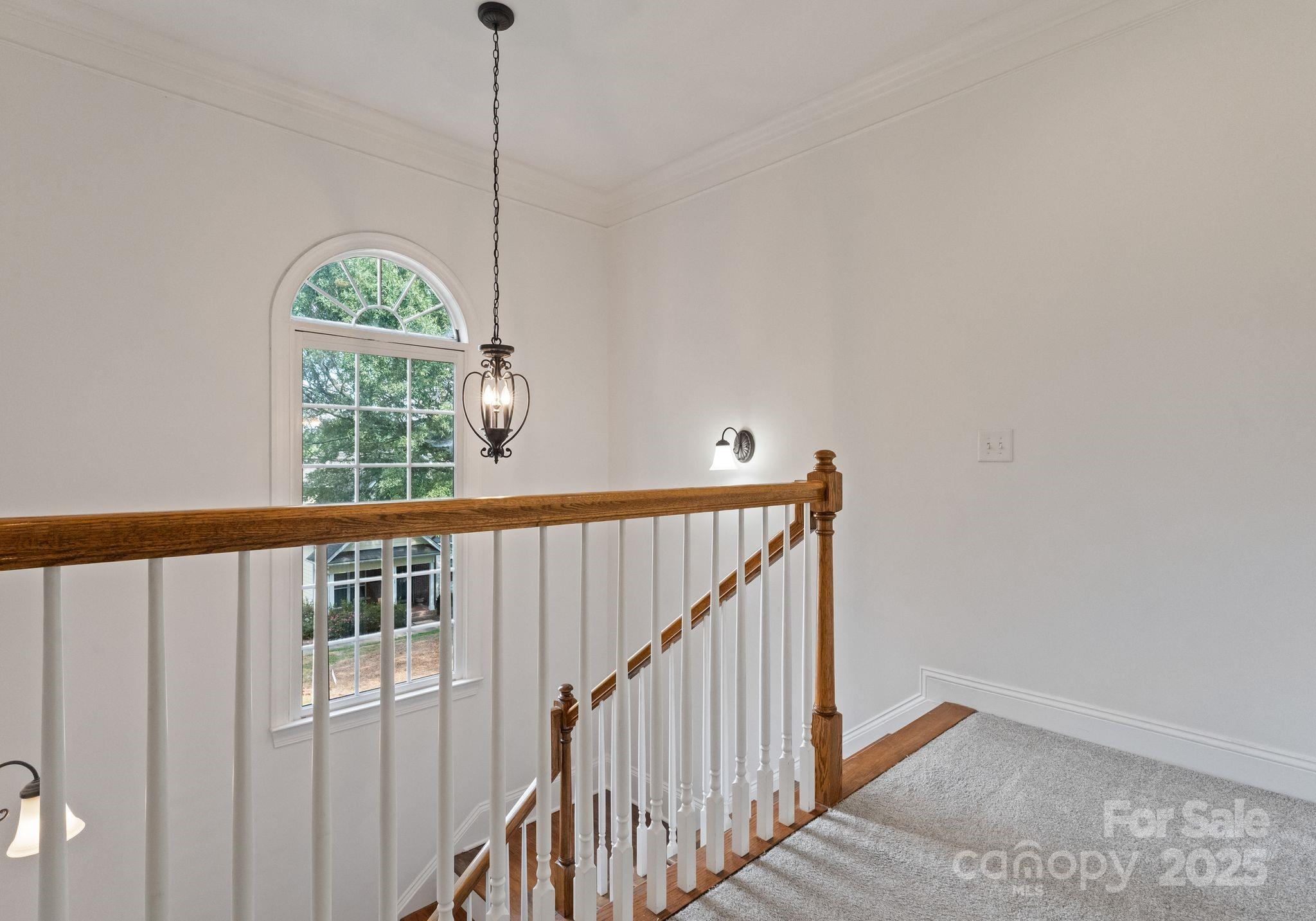 20237 Harroway Drive Cornelius, NC 28031 - Photo 18 of 23 a view of entryway with wooden floor