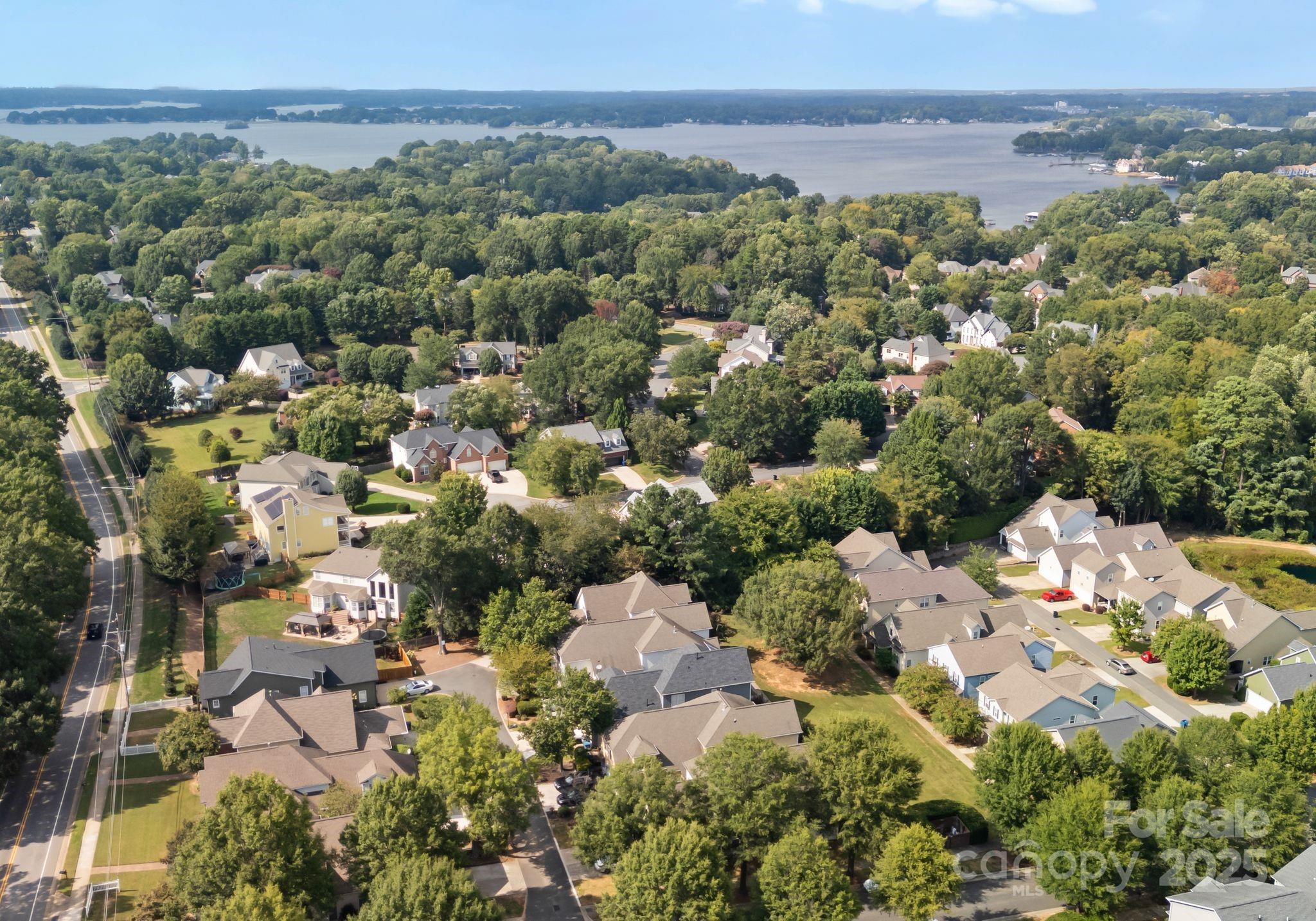 20237 Harroway Drive Cornelius, NC 28031 - Photo 23 of 23 an aerial view of a city with lots of residential buildings