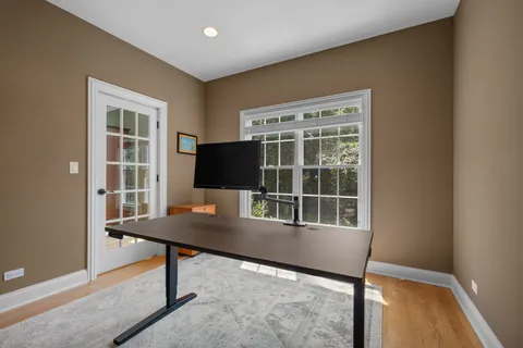 a view of a workspace with furniture