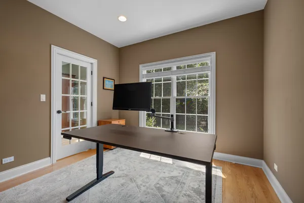 a view of a workspace with furniture