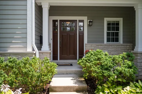 a front view of a house with a yard