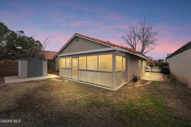 a view of backyard of house