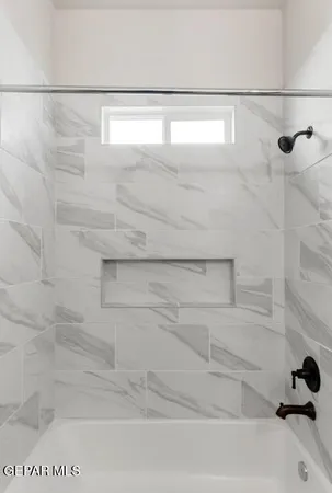 a bathroom with a bathtub