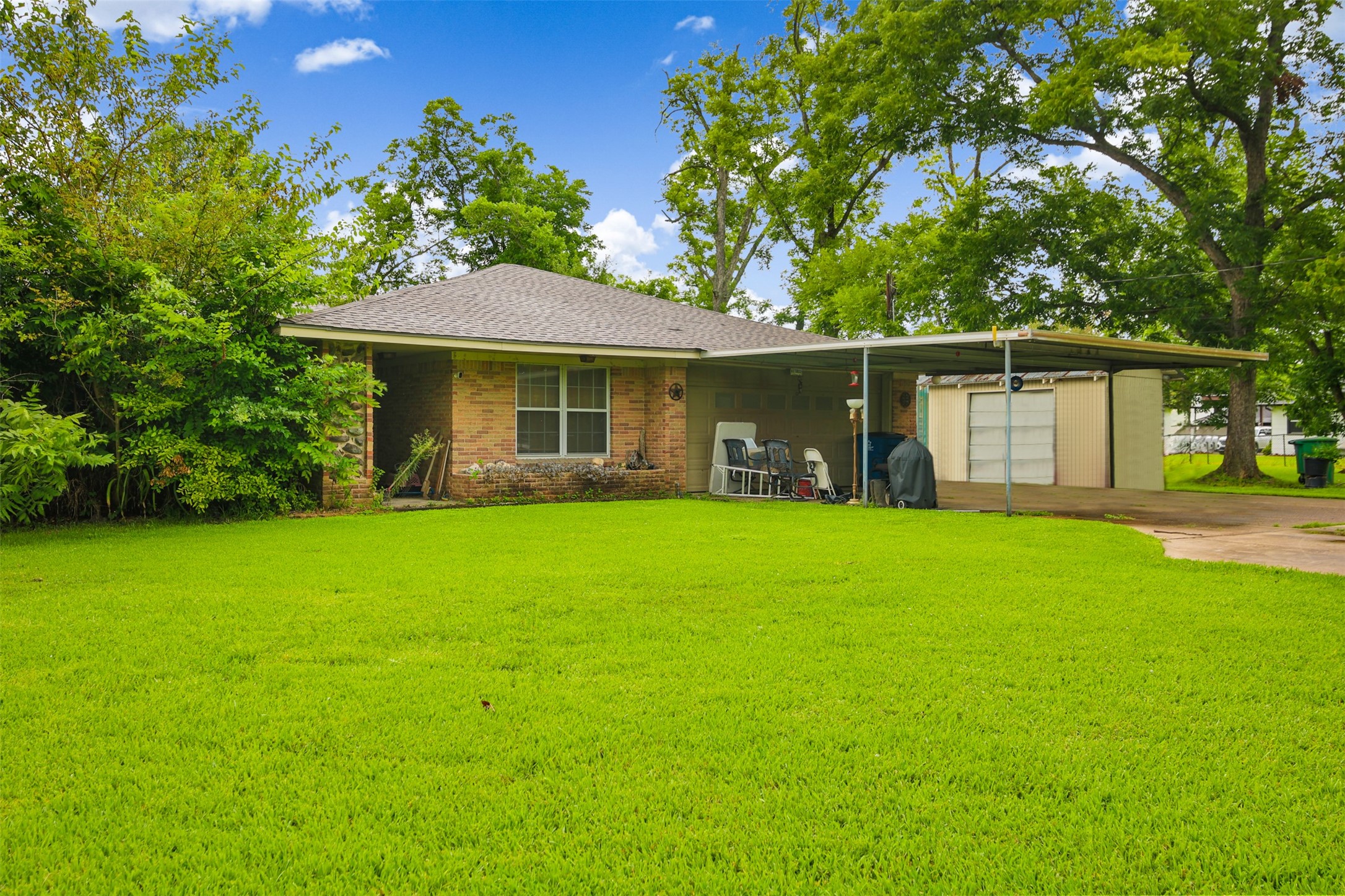 8406 East Mt Houston Road Houston, TX 77050 - Photo 23 of 30 a front view of a house with garden
