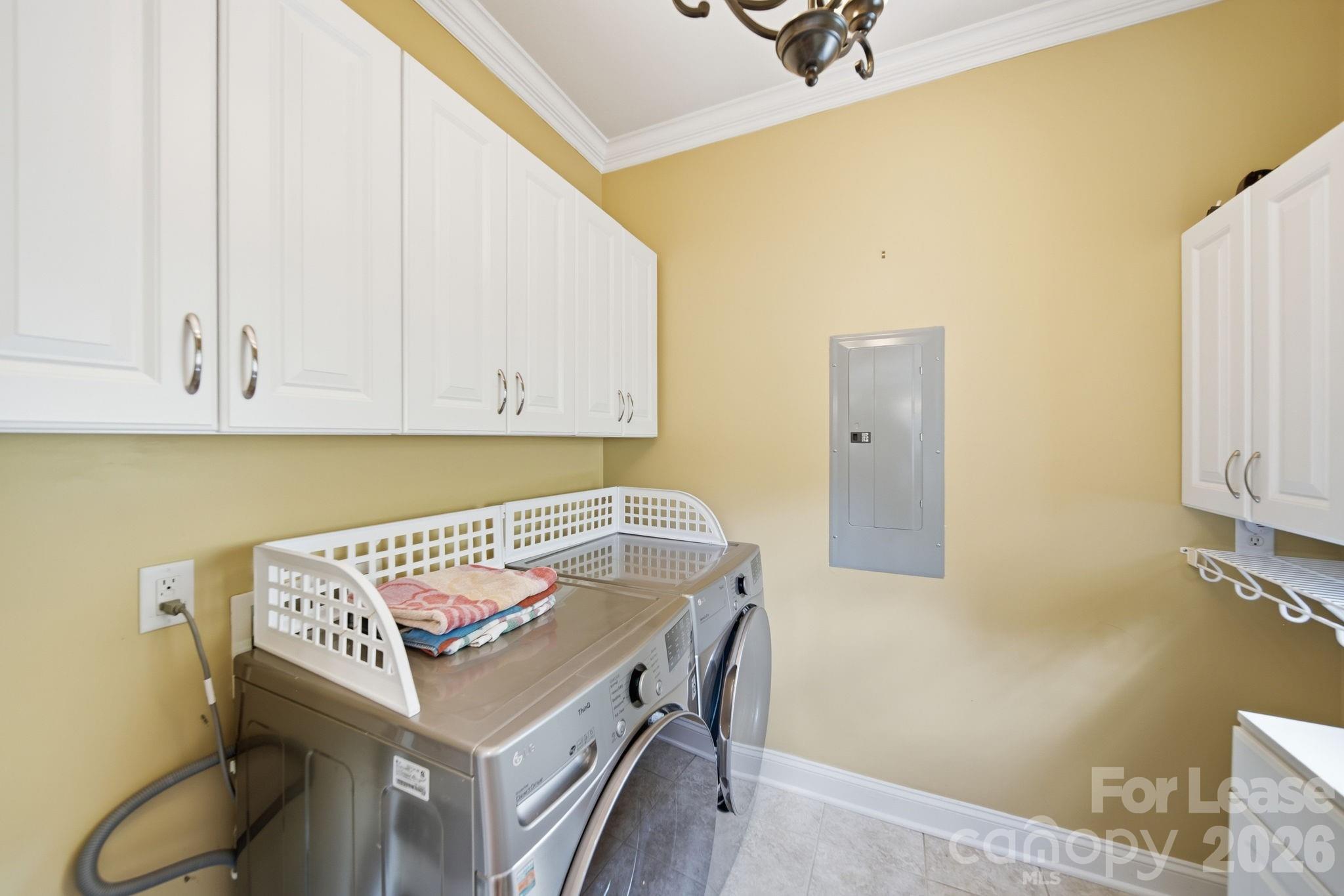 7107 Nesbit Road Waxhaw, NC 28173 - Photo 22 of 42 a utility room with dryer and washer