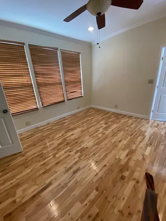 a view of an empty room with stairs