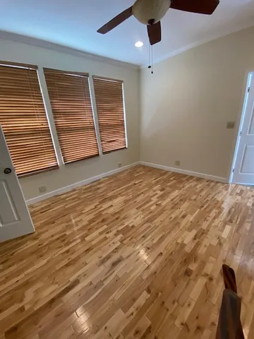 a view of an empty room with stairs
