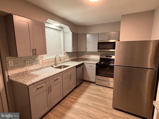 7912 Riggs Road Hyattsville, MD 20783 - Photo 7 of 40 View of new LVP floors and granite countertop