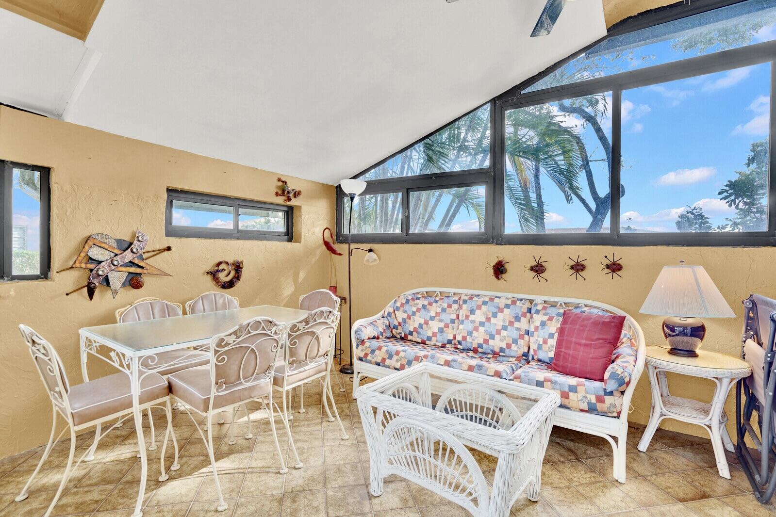 5810 Princess Palm Court, Unit B Delray Beach, FL 33484 - Photo 16 of 24 GLASS ENCLOSED PORCH