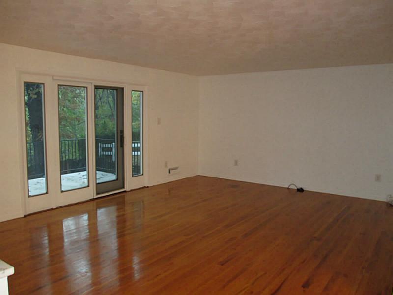 42 Churchill Road Churchill, PA 15235 - Photo 3 of 22 Living Room. The large open living room leads to a patio beyond the sliding doors. It s so will treed, you may not need window covers!