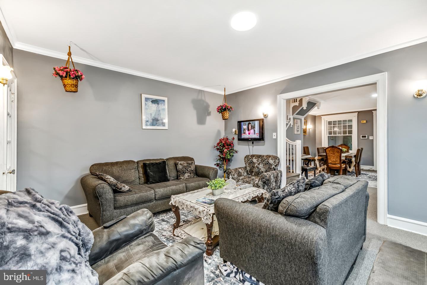 6243 Carpenter Street Philadelphia, PA 19143 - Photo 14 of 55 a living room with furniture and a flat screen tv