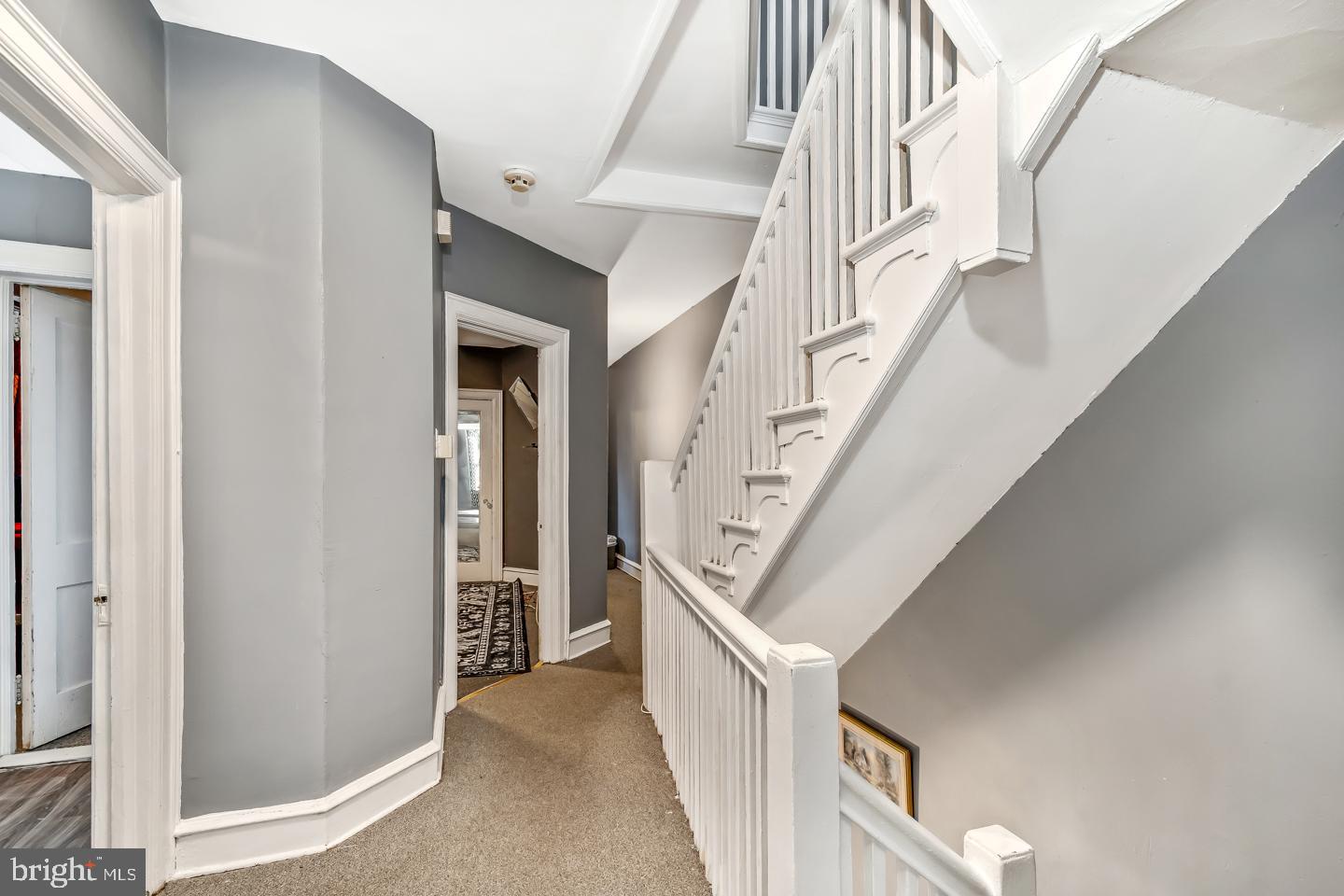 6243 Carpenter Street Philadelphia, PA 19143 - Photo 33 of 55 Inviting hallway with elegant staircase.