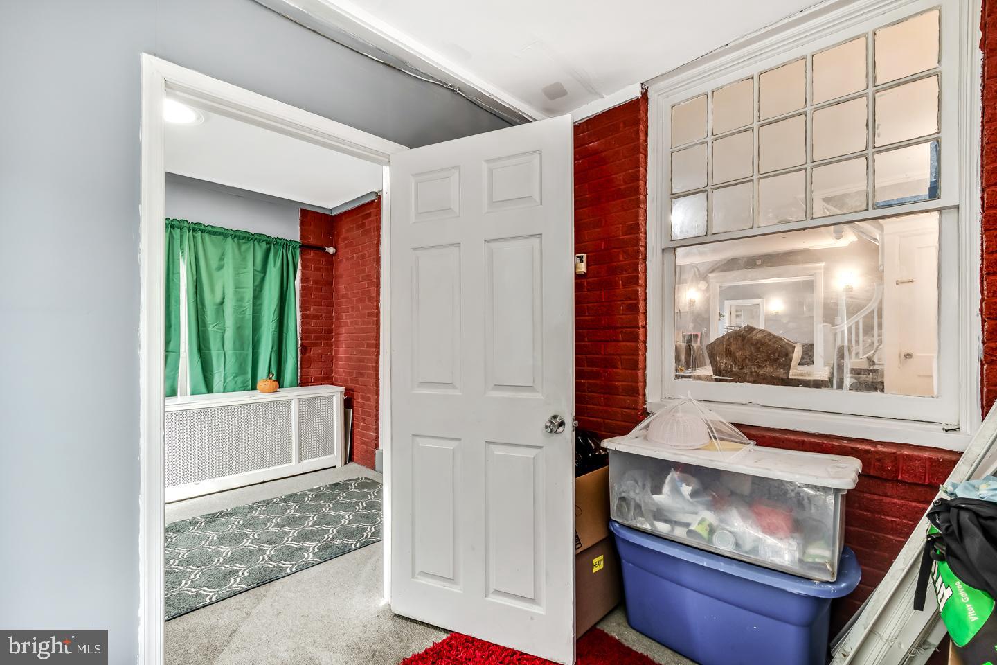 6243 Carpenter Street Philadelphia, PA 19143 - Photo 53 of 55 a room with furniture and a window